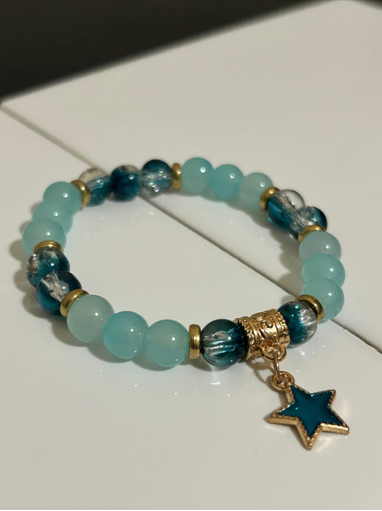 Beaded Bracelet with Mixed Colors, A charm, and intervals