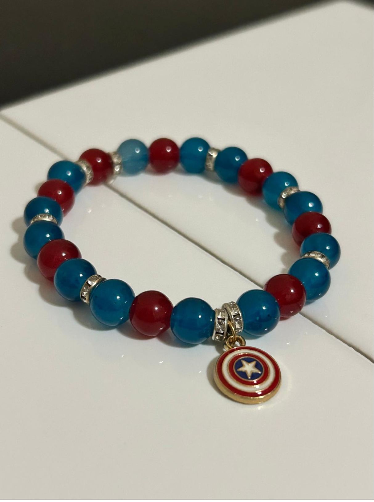 Beaded Bracelet with Mixed Colors, A charm, and intervals